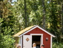 Family at a camping cabin.