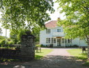 Historic hostel in a scenic setting.