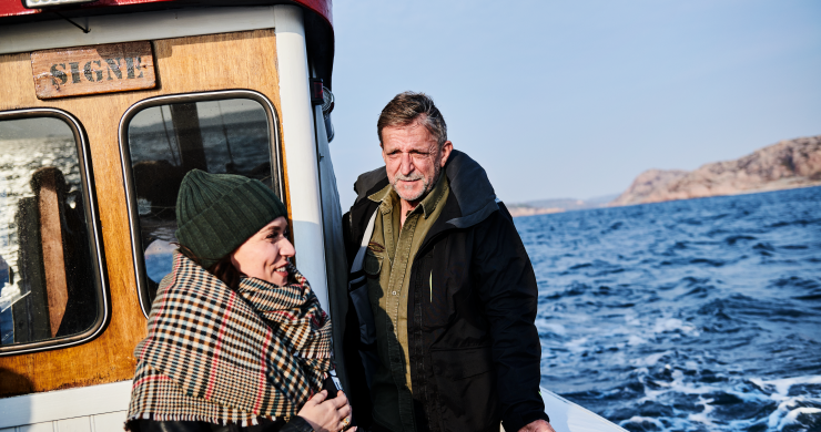 Woman and a man on a boat