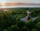 Drone picture over Kinnekulle observatory tower and lake Vänern