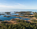 Flygbild över en en sjö med dess skärgård. 