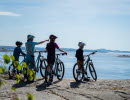 Family bikes on cliffs.